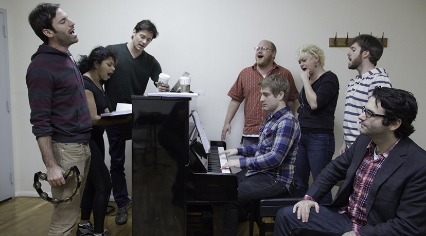 The cast of Bloodsong of Love in rehearsal (writer Joe Iconis, front right).
