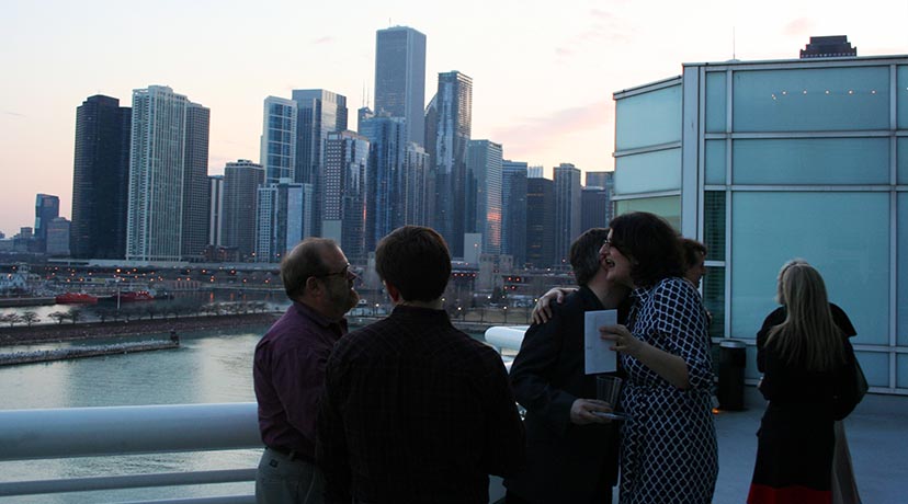 Attendees network and enjoy the view at the Kick-Off Cocktail Party at Chicago Shakespeare Theater