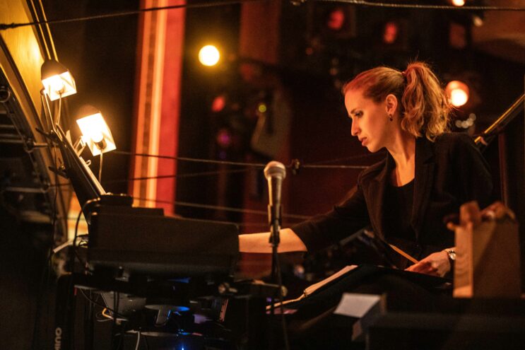 Andrea Grody conducting Tootsie on Broadway. Photo Credit: Matt Murphy.